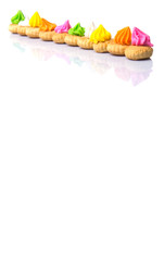Belly button iced gem biscuits over white background