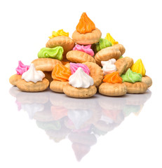 Belly button iced gem biscuits over white background