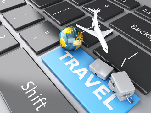 suitcase, airplane and earth on computer keyboard. Travel concep