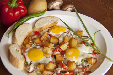 fried eggs including french bread,mushro,fried potato