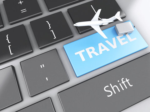 travel suitcase and airplane on computer keyboard. Travel concep