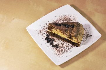 Cake tiramisu with coffee grains.