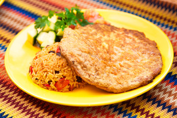 Escalope in batter with stamping and vegetables