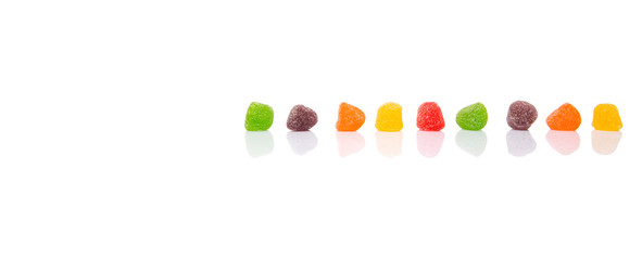 Colorful mix sugar jelly candy over white background
