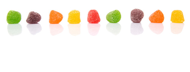 Colorful mix sugar jelly candy over white background