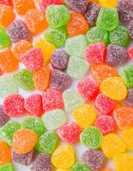 Colorful mix sugar jelly candy over white background