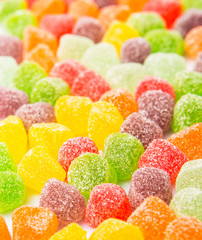 Fototapeta na wymiar Colorful mix sugar jelly candy over white background