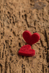Fototapeta premium hearts on wooden surface
