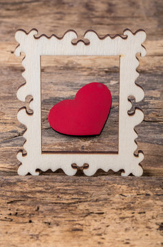 heart in a wooden frame