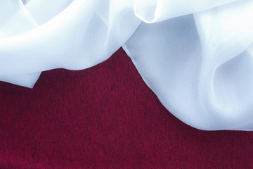 fine silk on marsala red background
