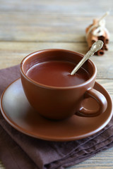 Sweet chocolate in a cup on napkin