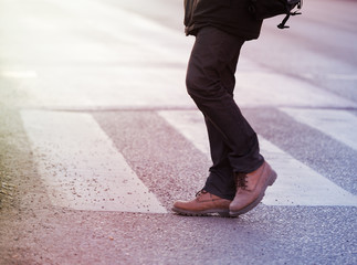 Man walking on zebra crossing