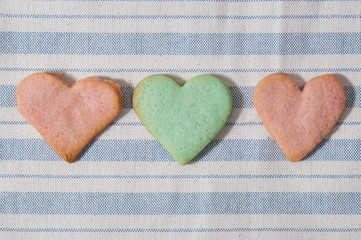 Green and red butter cookies, heart shaped