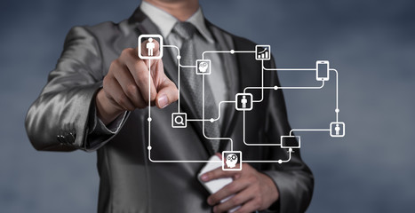 Businessman working with digital object