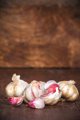 Garlic on a rustic wooden table