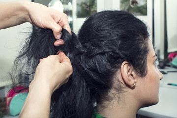 Fototapeta premium woman in a beauty salon doing hair