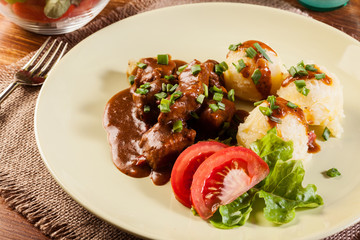 Goulash with boiled potatoes