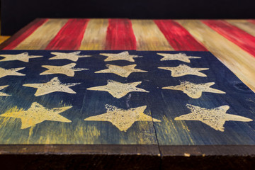 Flag of the old USA drawn on a wood table