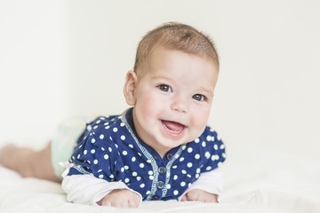 Happy and Smiling Caucasian Newborn LIttle Girl