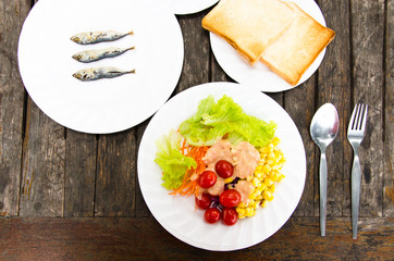 Breakfast with salad and dried fish