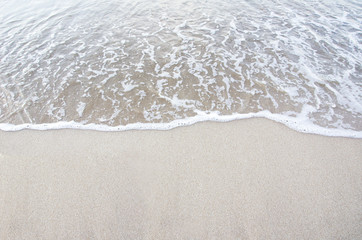 Sand beach with wave