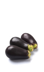Black skinned eggplant over white background