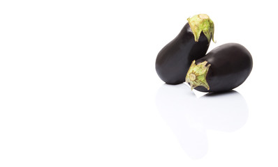 Black skinned eggplant over white background