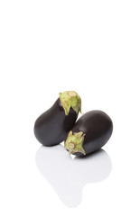 Black skinned eggplant over white background