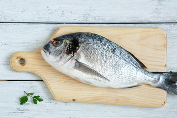 Raw Dorade with parsley and lemon pepper