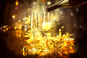 New Year celebration with champagne. Holiday decorated table