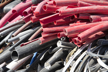 a pile of scrap plastic cables