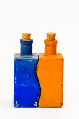 Two glass decorative bottles