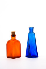 Two glass decorative bottles