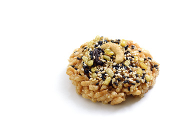 Dried rice biscuit and sprinkle ground sesame mixed with dry soy