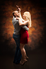 Young couple dances Caribbean Salsa