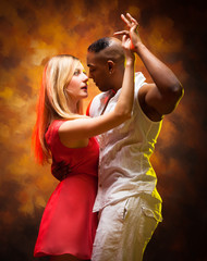 Young couple dances Caribbean Salsa