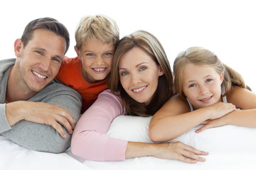 Portrait of a happy young family with two children