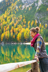 Young woman on lake braies in south tyrol, italy 