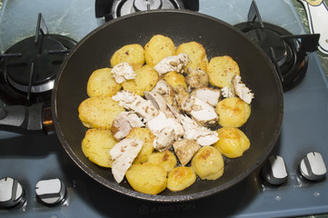 The fried potatoes and chicken