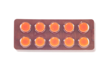 Medicine tablet in brown blister pack and shadow effect