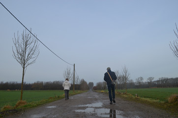 man walking in countryside