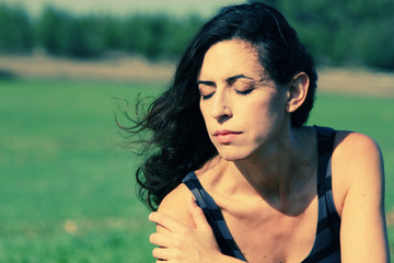 Portrait of beautiful 35 years old woman outdoors