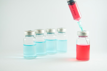 Action of liquid pump from vial by syringe