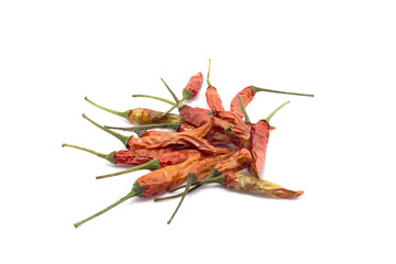 Close up of dried chili on white background
