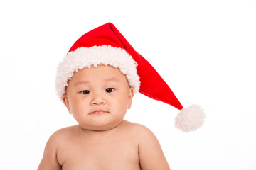 baby in santa cap on white background