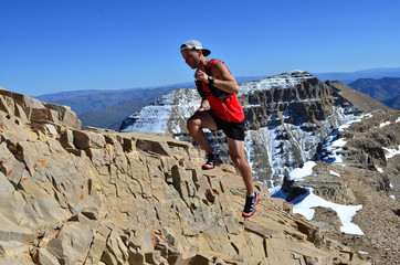 Trail Running Man on Mountain