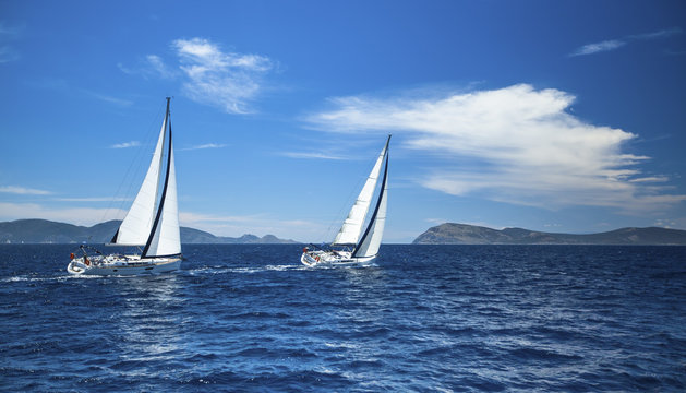 Boats in sailing regatta. Luxury yachts.