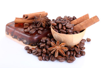 Organic soap with coffee beans and spices, isolated on white