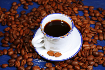 Cup of coffee on wooden table