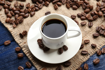 Cup of coffee on wooden table